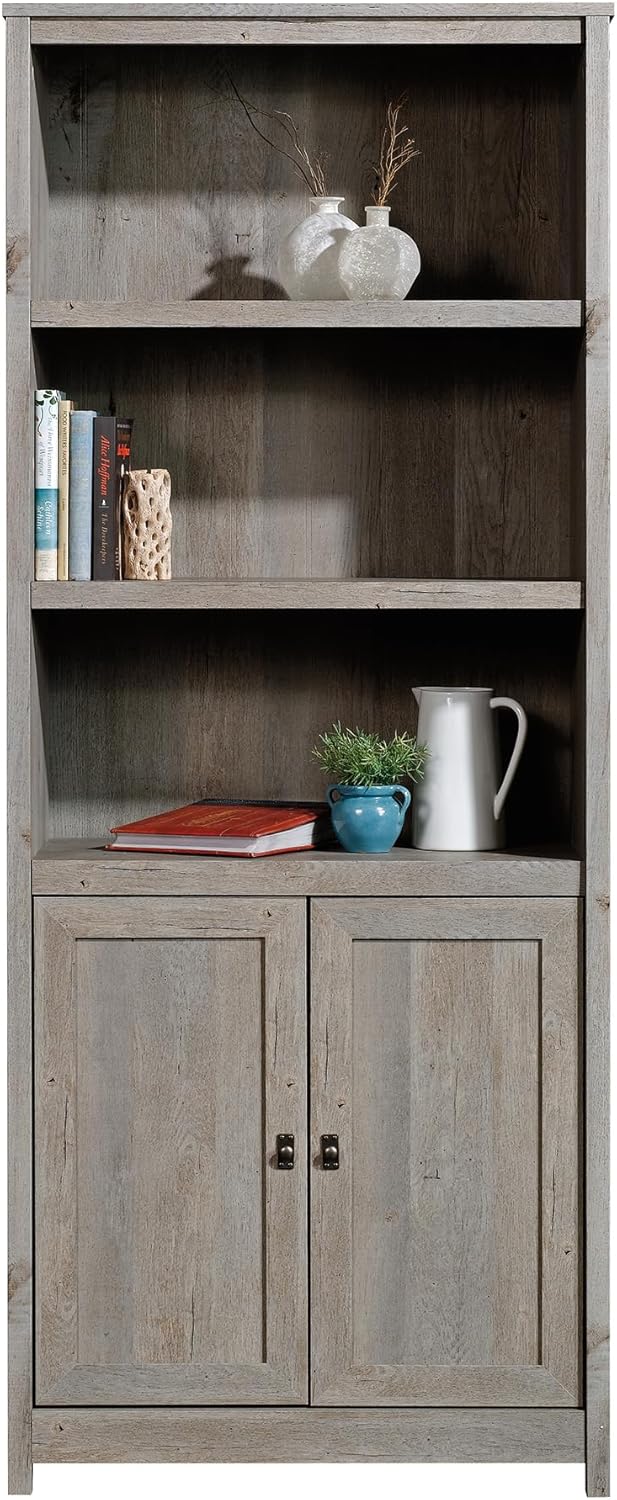 Sauder Cottage Road Book Shelf, Bookshelf with Storage, Library Bookcase with Doors and Adjustable Shelves, in Mystic Oak Finish